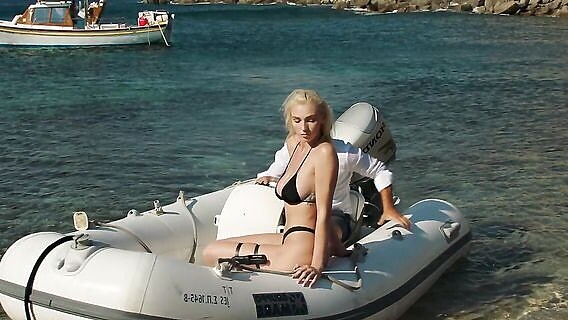 Sex on the beach with a busty blonde 